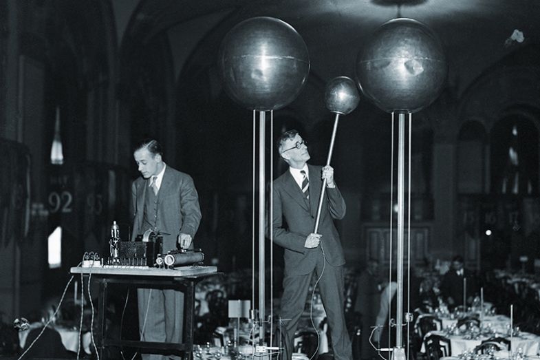 Scientists including Dr Vannevar Bush (right) demonstrating the Dr Robert Van De Graf 1,500,000 volt generator which, it is said, will be capable of producing a shock of 10,000,000 volts Scientists including Dr Vannevar Bush (right) demonstrating the Dr Robert Van De Graf 1,500,000 volt generator which, it is said, will be capable of producing a shock of 10,000,000 volts